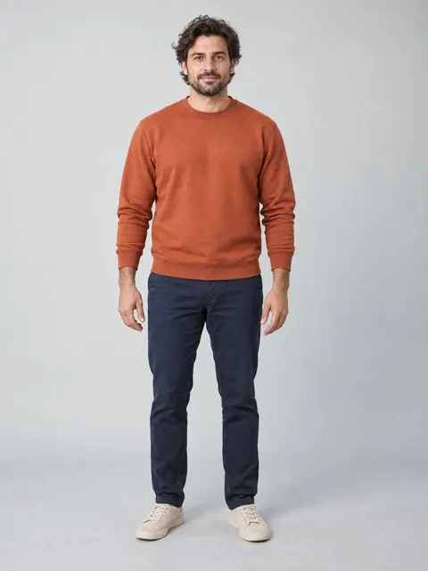 Input portrait: fictional adult in a rust-colored shirt for the selfie role